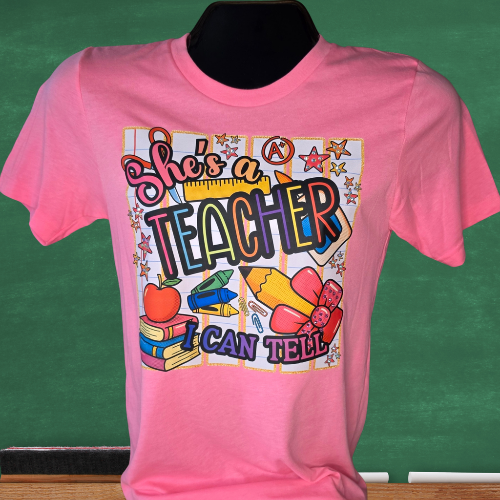 She's a Teacher I Can Tell Bell Canvas T-shirt with Rhinestone Bling Accents